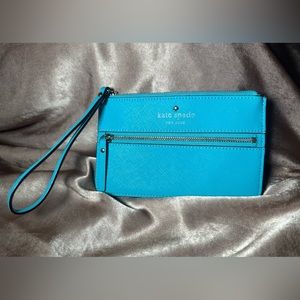 Kate spade wristlet, turquoise. Two zippered pockets.